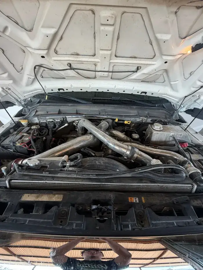 Hood up on a diesel engine bay